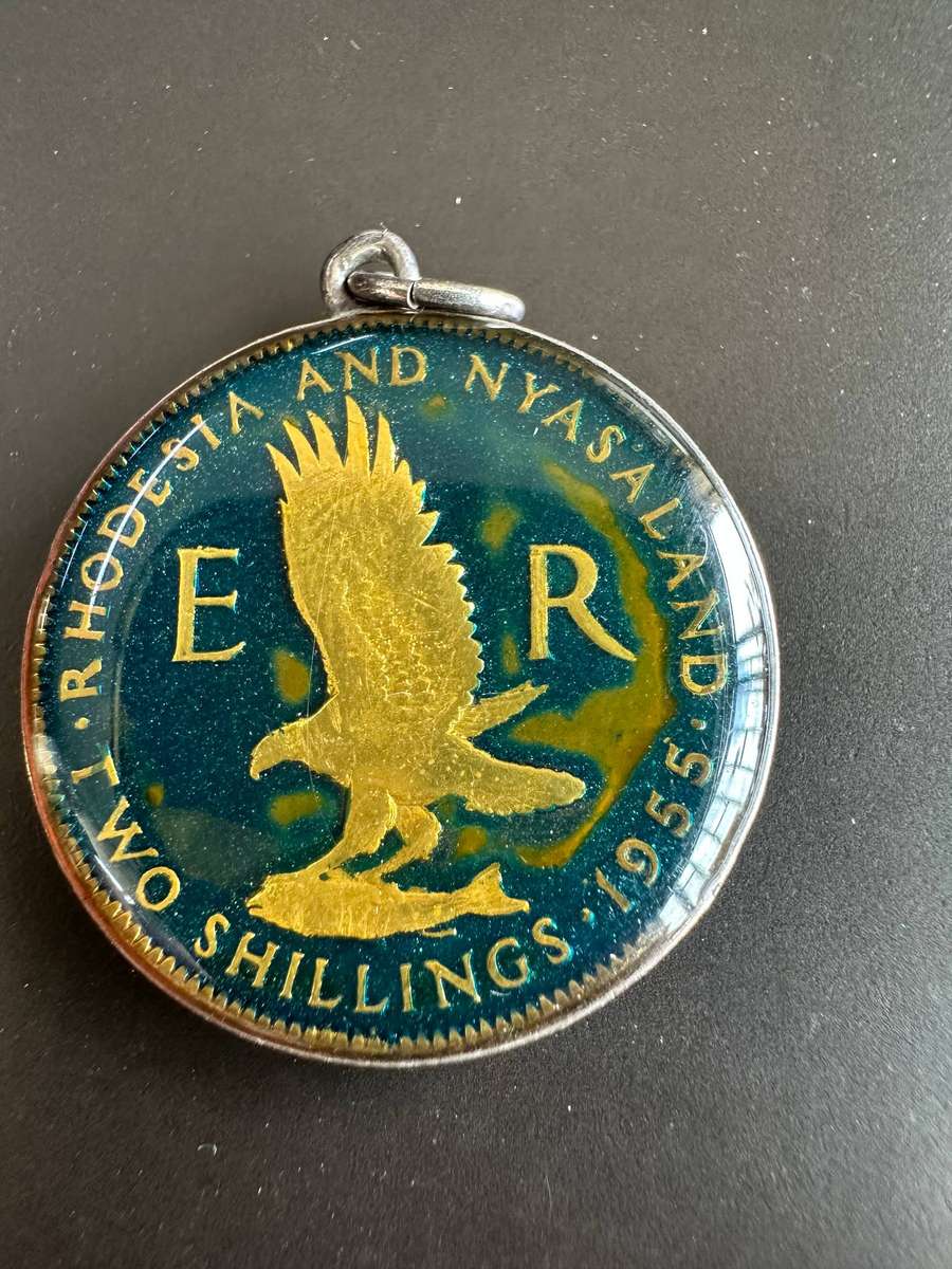Rhodesia & Nyasaland enamelled two shillings 1955