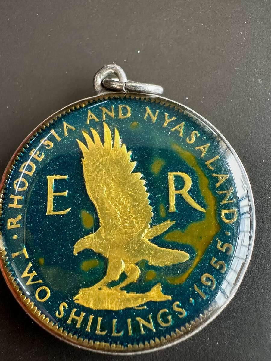 Rhodesia & Nyasaland enamelled two shillings 1955