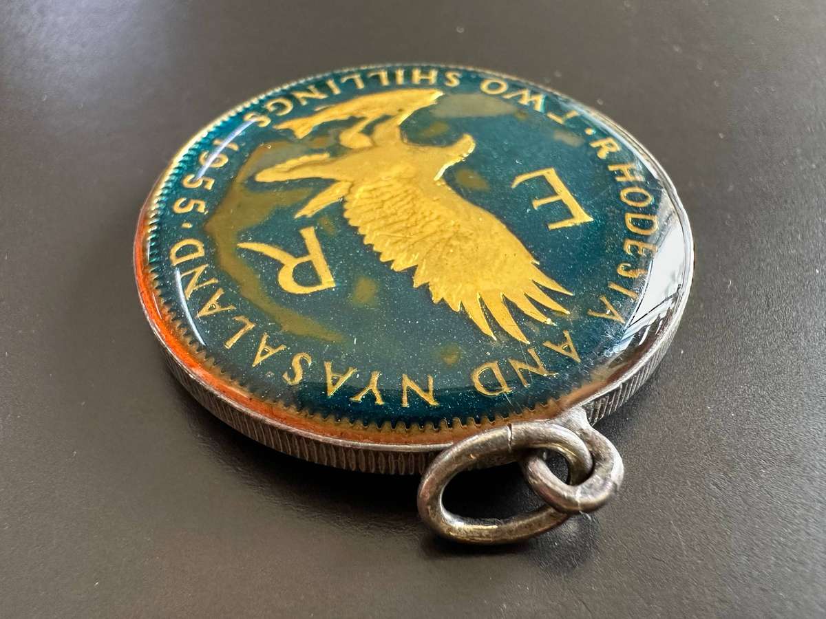 Rhodesia & Nyasaland enamelled two shillings 1955