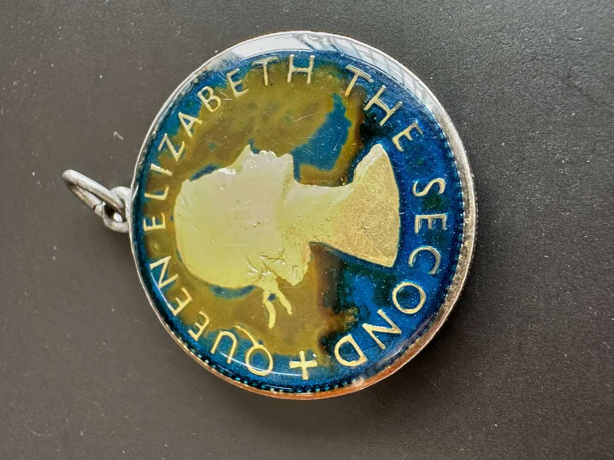 Rhodesia & Nyasaland enamelled two shillings 1955