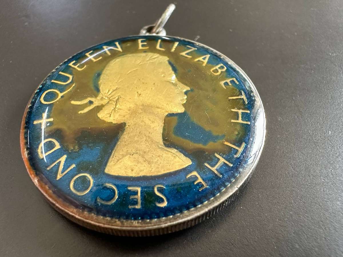 Rhodesia & Nyasaland enamelled two shillings 1955