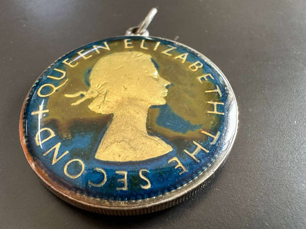 Rhodesia & Nyasaland enamelled two shillings 1955