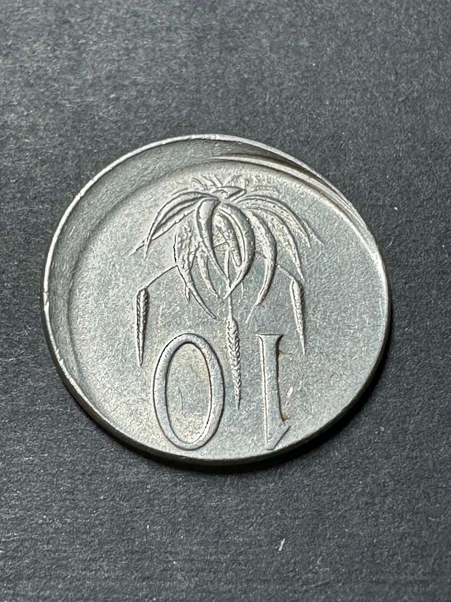 1965 English Error 10 cent coin