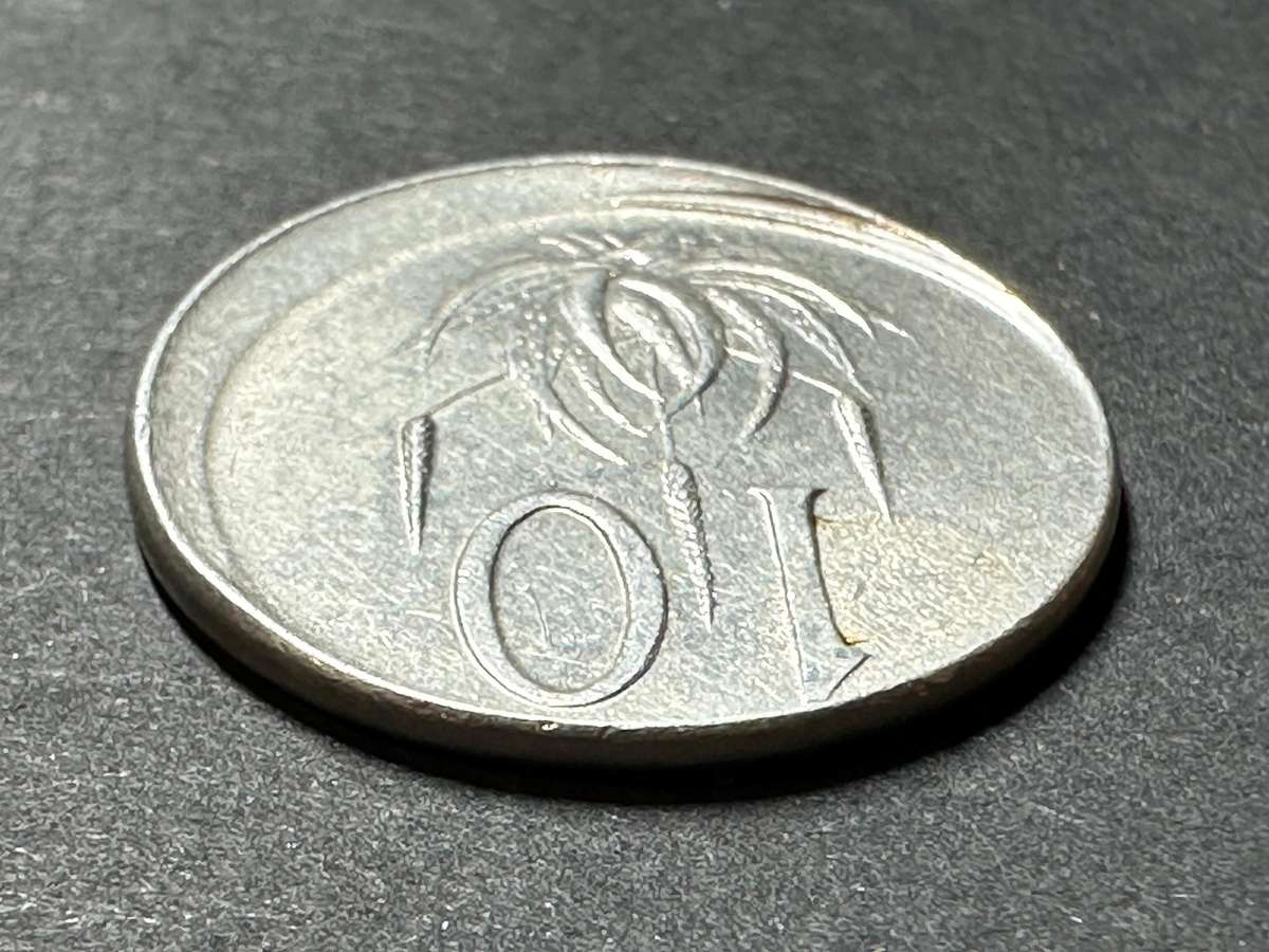 1965 English Error 10 cent coin