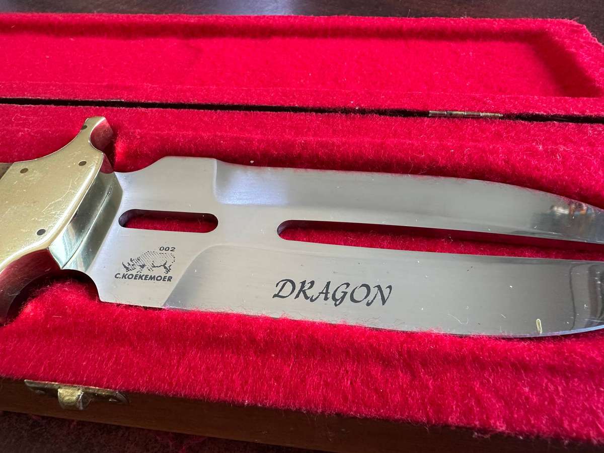 A stunning double side C. Koekemoer handmade knife in stunning display box