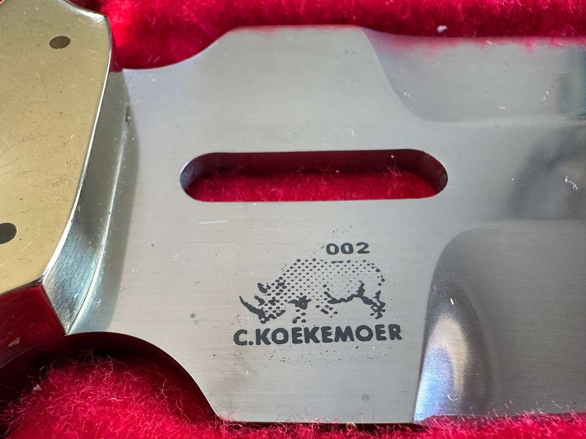 A stunning double side C. Koekemoer handmade knife in stunning display box