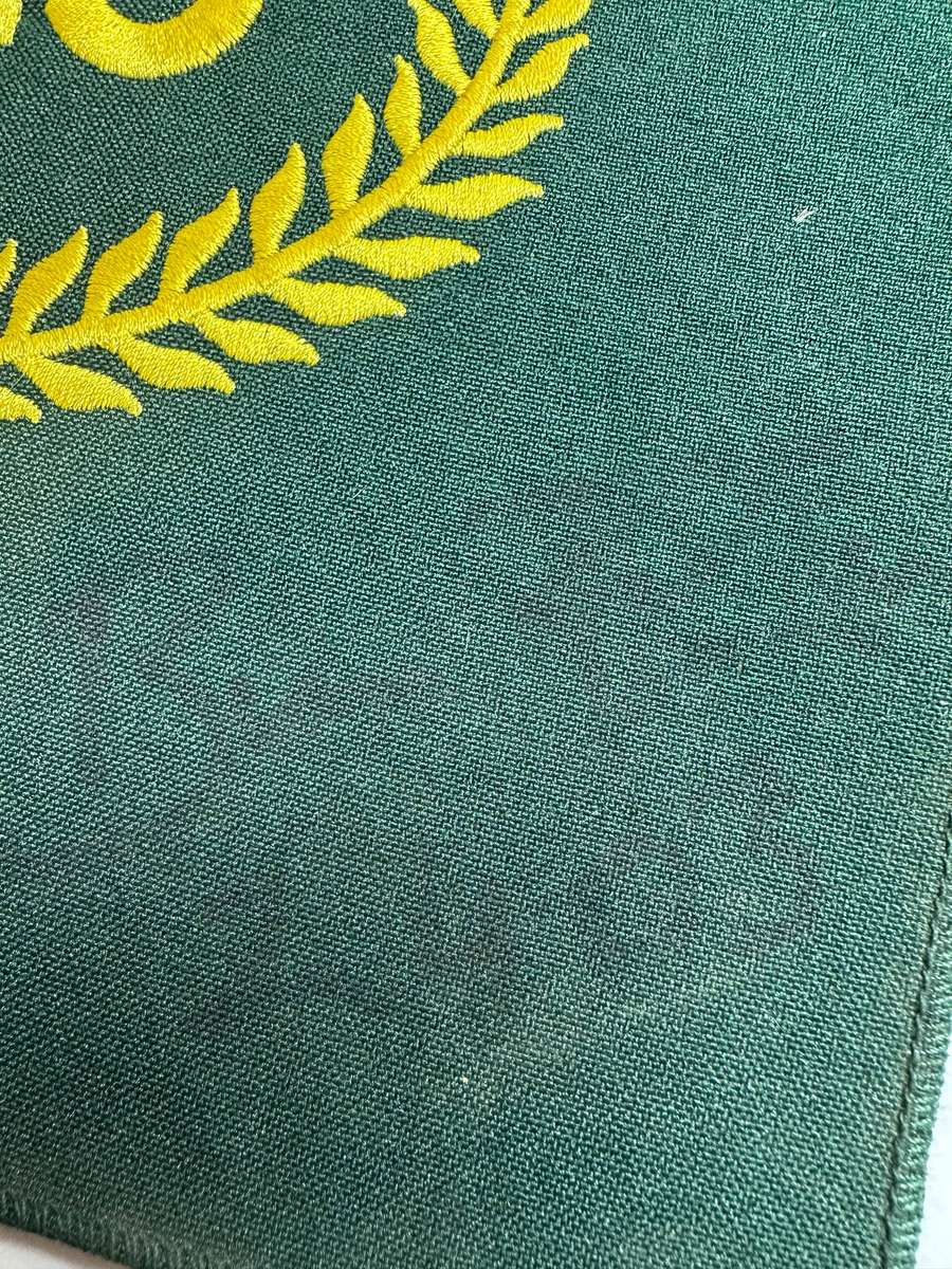 Comrades Marathon Folder with 11 medals, cloth badges etc.