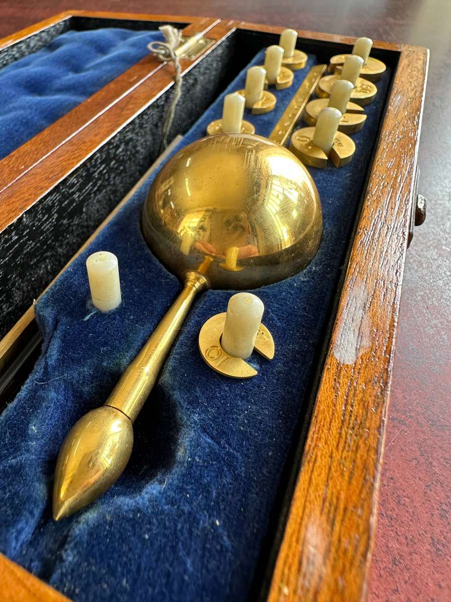A cool antique hydrometer in original storage box