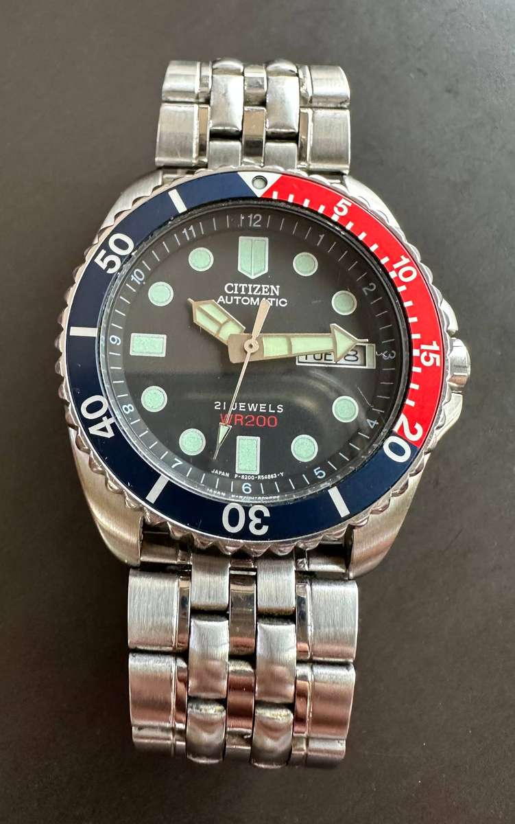 A Citizen automatic WR200 mens wristwatch