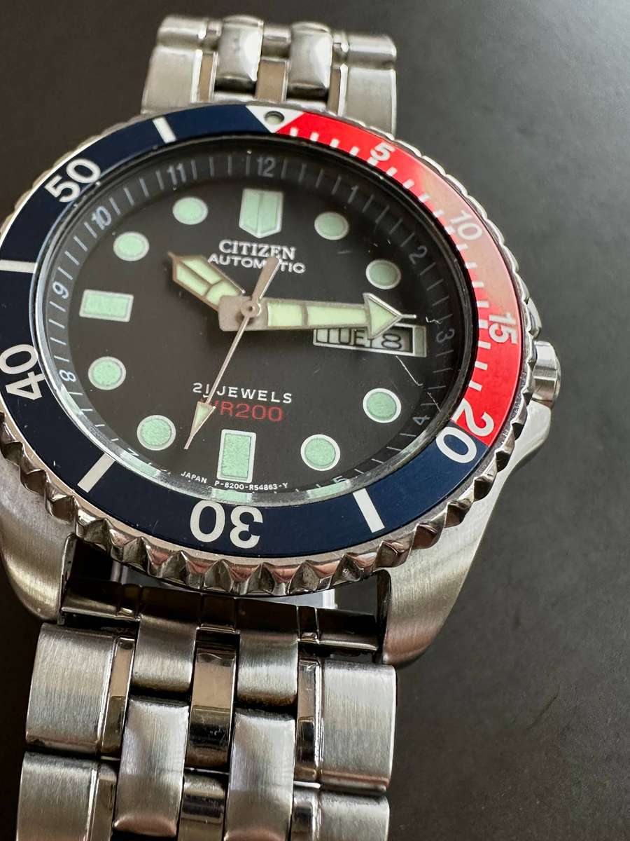 A Citizen automatic WR200 mens wristwatch