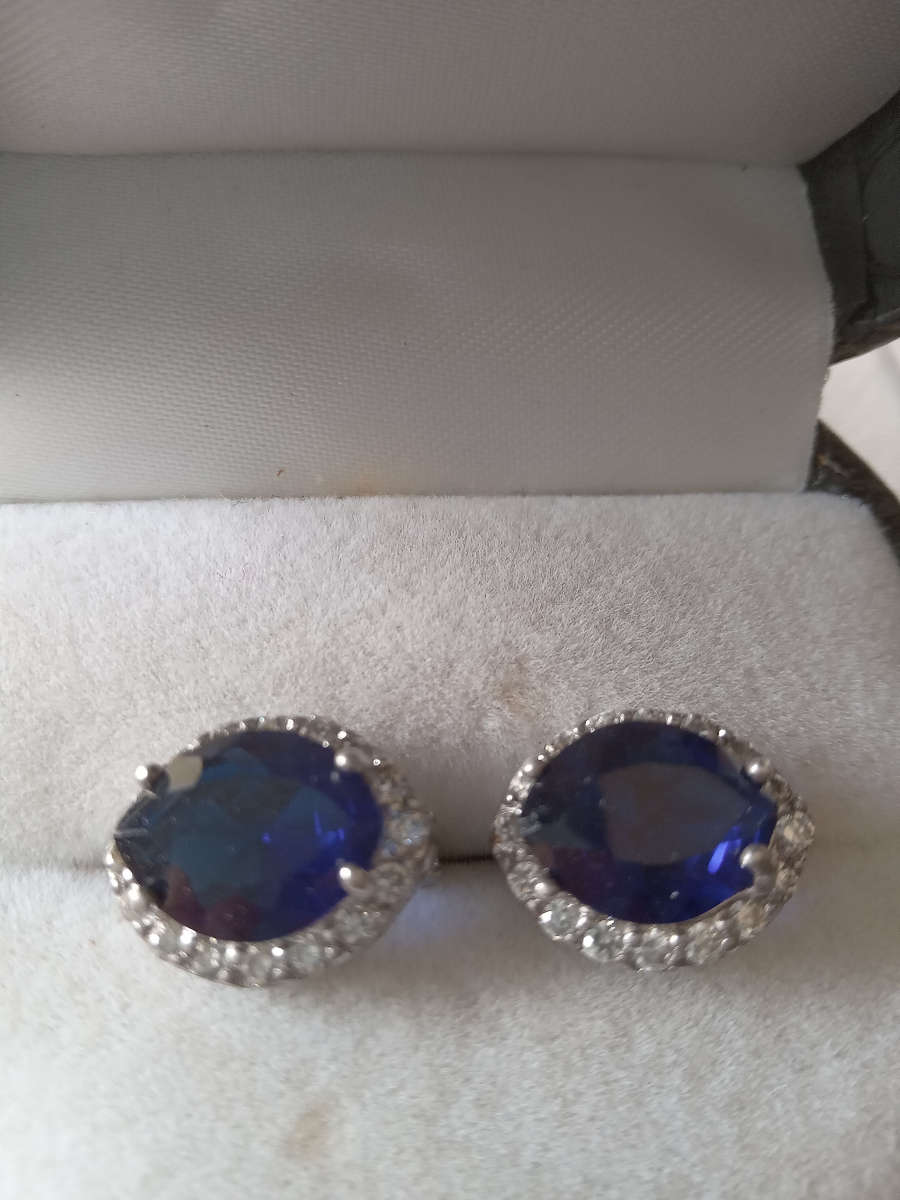 A Pair Of Sterling Silver Blue And White Cz Earrings