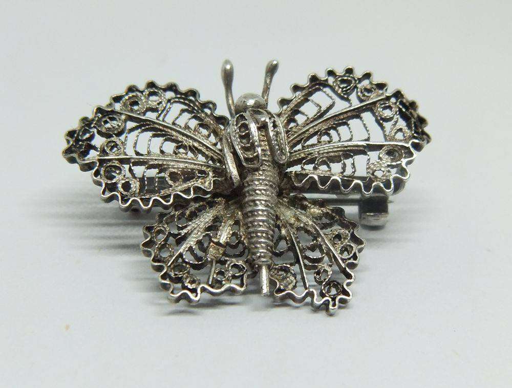 A vintage Egyptian 800 silver filigree butterfly brooch