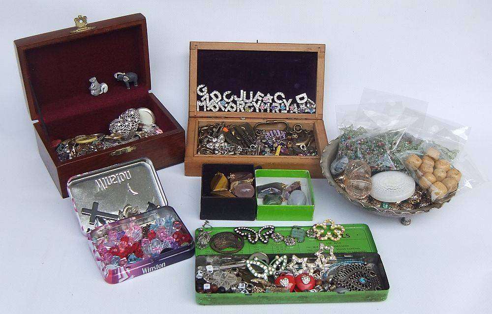 A joblot of jewelry crafting and other spares in a vintage wooden box and other vintage holders