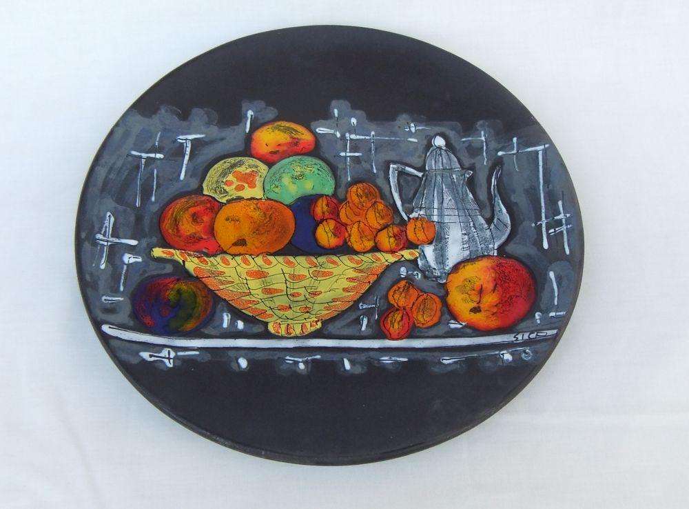 A rare mid-century signed Italian pottery wall charger with intricate detail