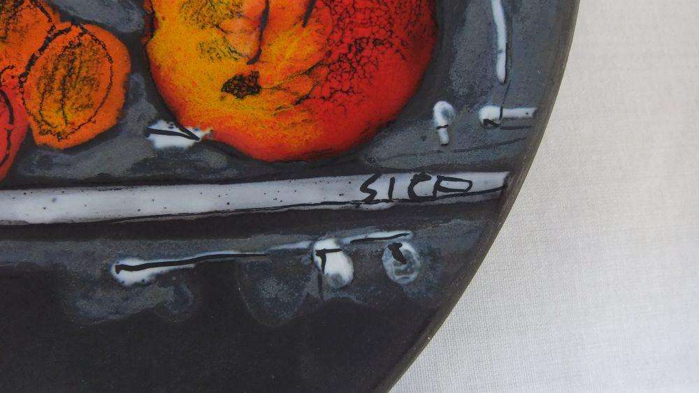 A rare mid-century signed Italian pottery wall charger with intricate detail