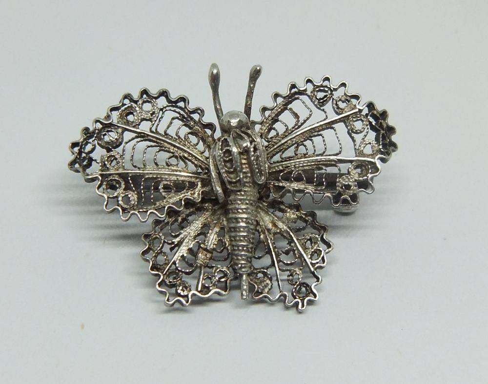A vintage Egyptian 800 silver filigree butterfly brooch