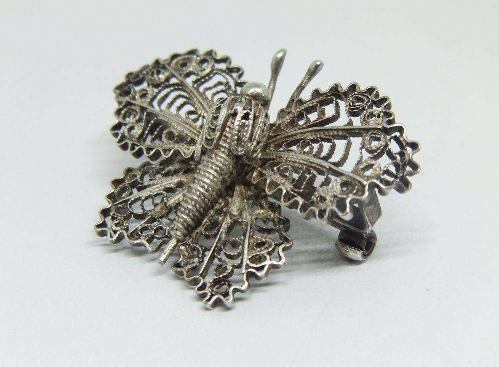 A vintage Egyptian 800 silver filigree butterfly brooch