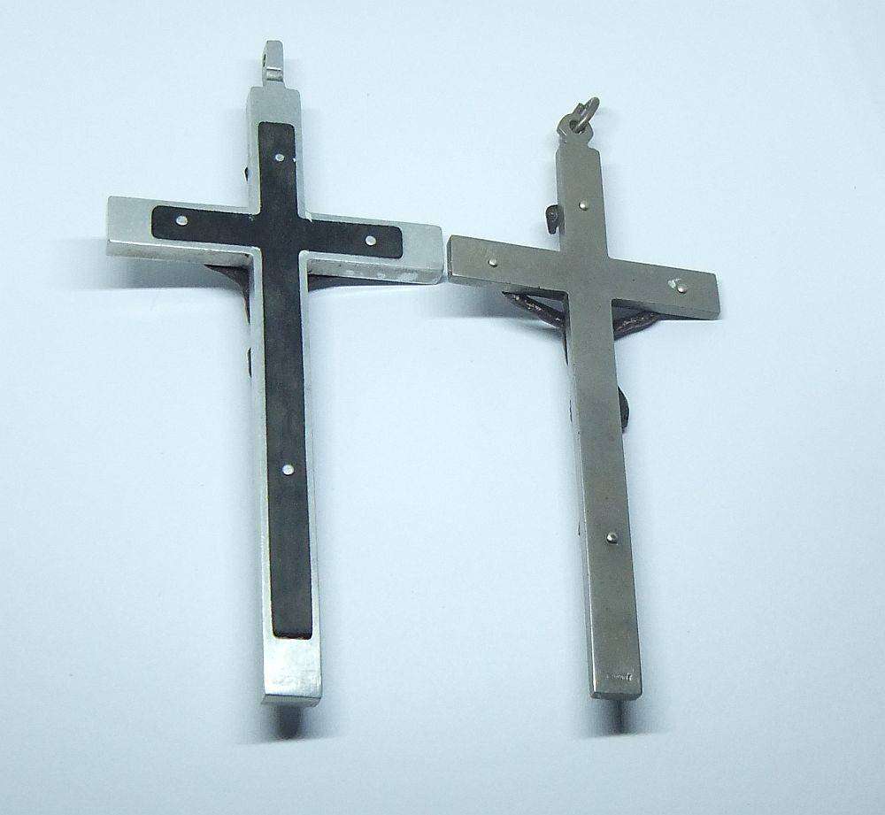 Two large detailed vintage metal crucifixes inlayed with wood