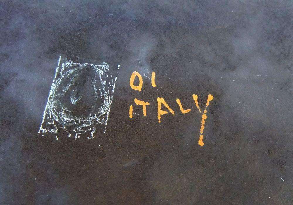 A rare mid-century signed Italian pottery wall charger with intricate detail