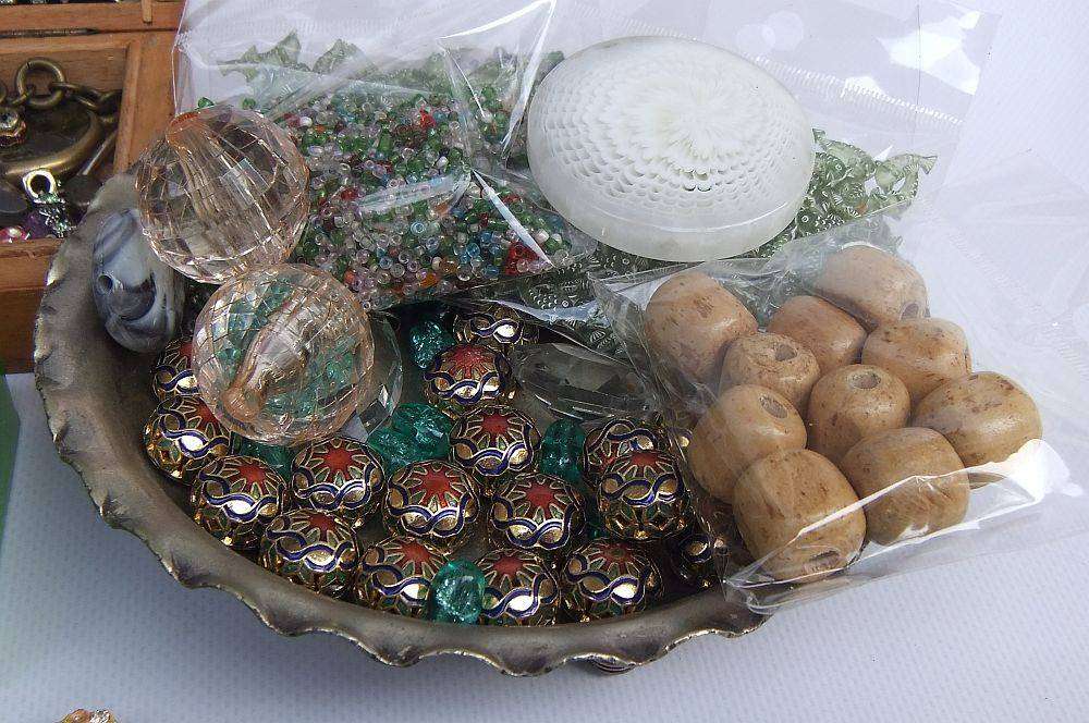 A joblot of jewelry crafting and other spares in a vintage wooden box and other vintage holders