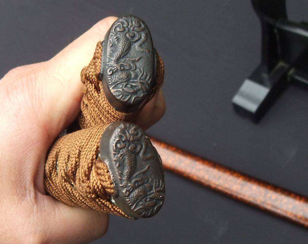 A Japanese sword set with stand
