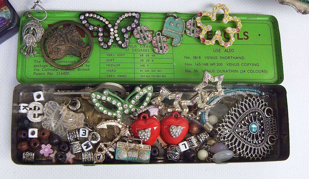 A joblot of jewelry crafting and other spares in a vintage wooden box and other vintage holders