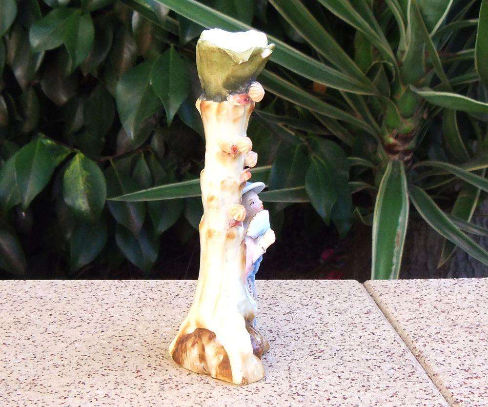 A rare Victorian era porcelain spill vase with Chinese man motif