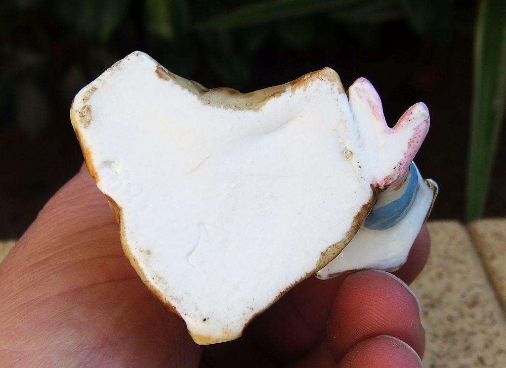 A rare Victorian era porcelain spill vase with Chinese man motif