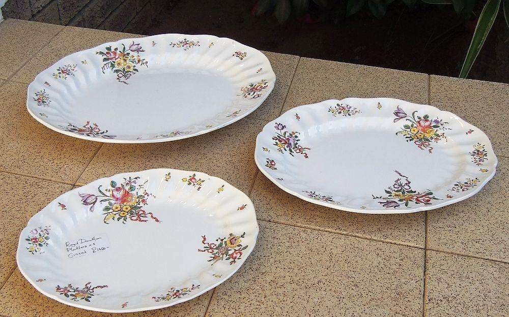A set of three early 20th century platters by Royal Doulton of England