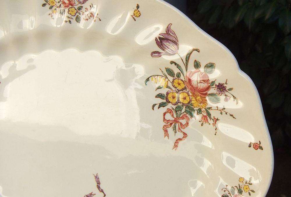 A set of three early 20th century platters by Royal Doulton of England