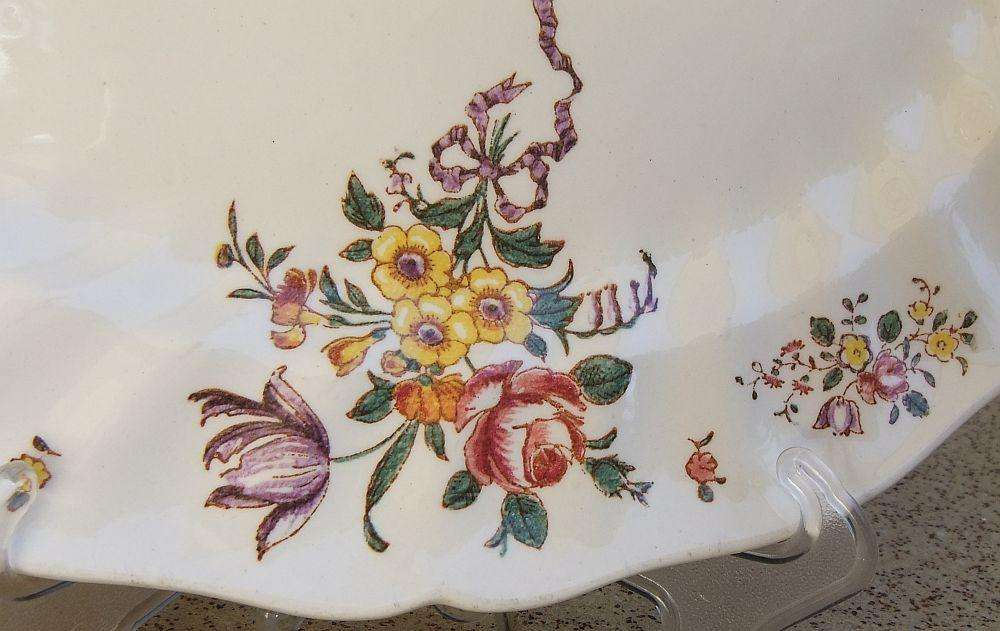 A set of three early 20th century platters by Royal Doulton of England