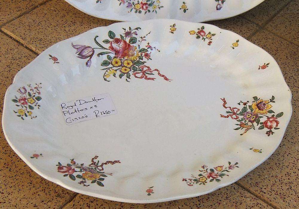 A set of three early 20th century platters by Royal Doulton of England
