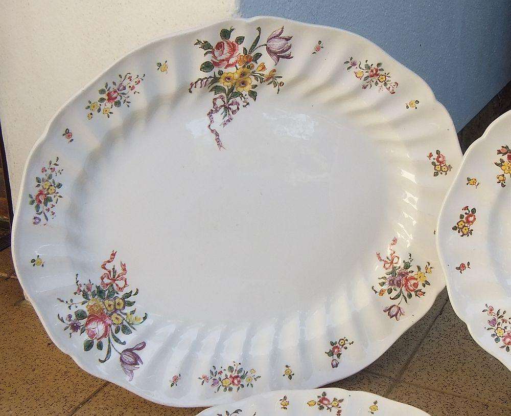 A set of three early 20th century platters by Royal Doulton of England