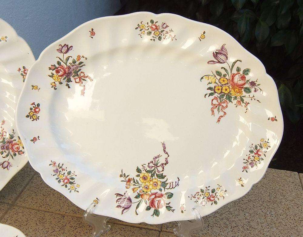 A set of three early 20th century platters by Royal Doulton of England