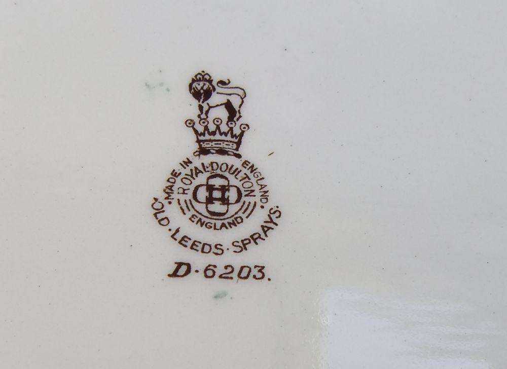 A set of three early 20th century platters by Royal Doulton of England