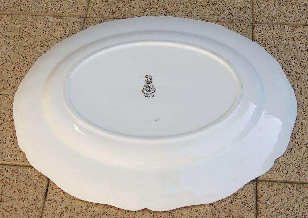 A set of three early 20th century platters by Royal Doulton of England