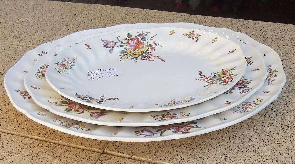 A set of three early 20th century platters by Royal Doulton of England