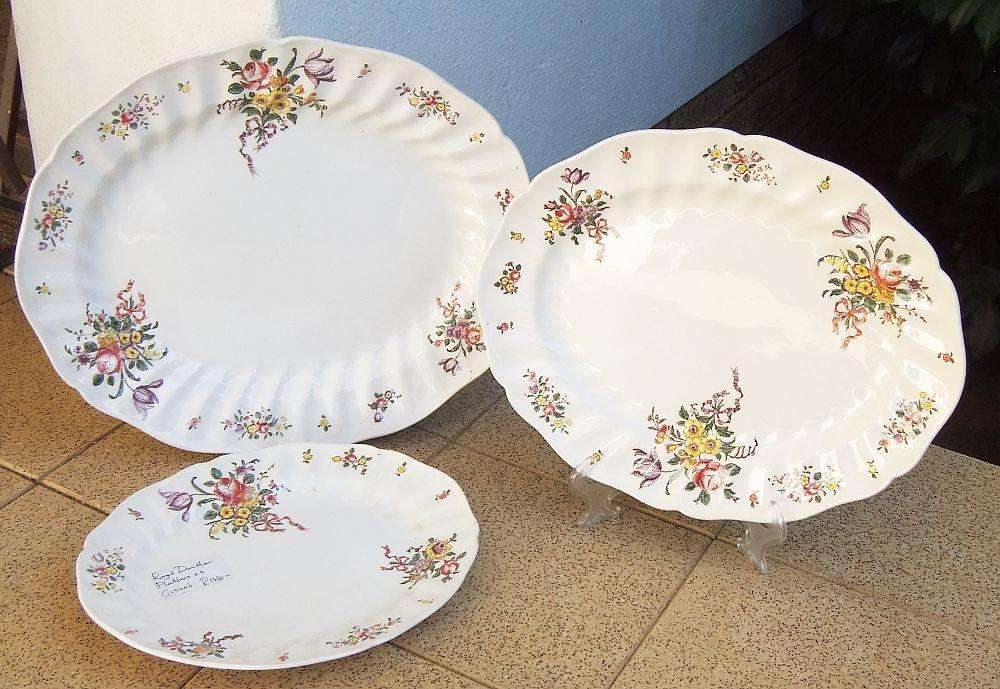A set of three early 20th century platters by Royal Doulton of England