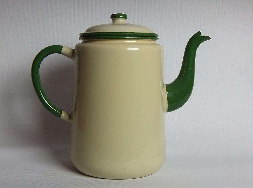 A vintage enamel camping tea or coffee pot