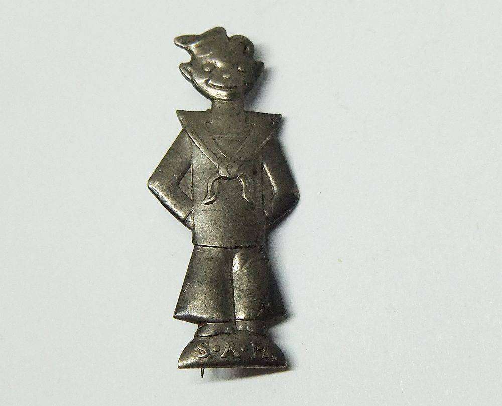 Militaria badge - A WW2 South African Navy sailor patriotic badge / lapel pin