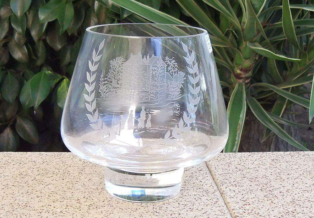 An engraved glass vessel by Caithness of Scotland