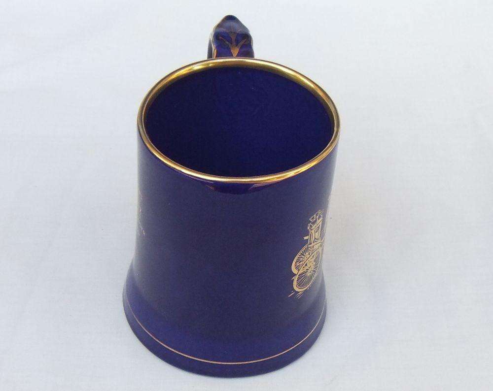 A vintage Wade porcelain jug depicting the 1899 Benz - Veteran cars No 1