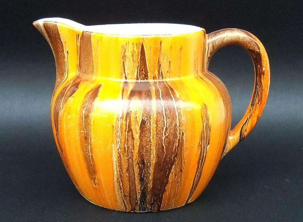 A hand painted 1930`s Art Deco period water jug by Myott, son & co England