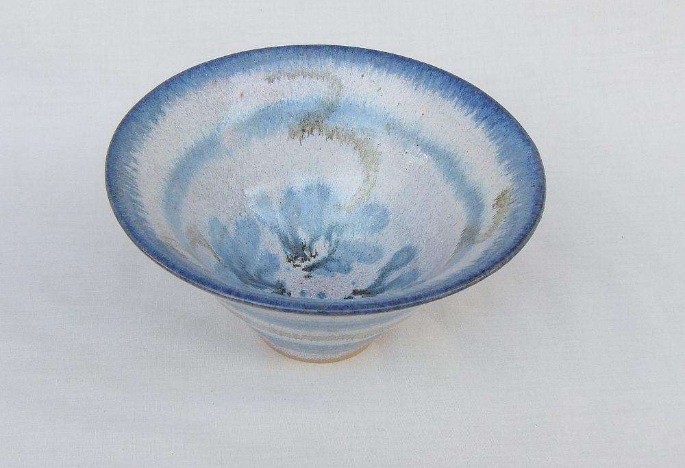 A vintage hand made pottery bowl