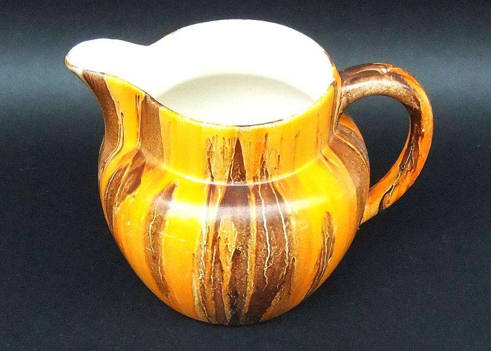 A hand painted 1930`s Art Deco period water jug by Myott, son & co England