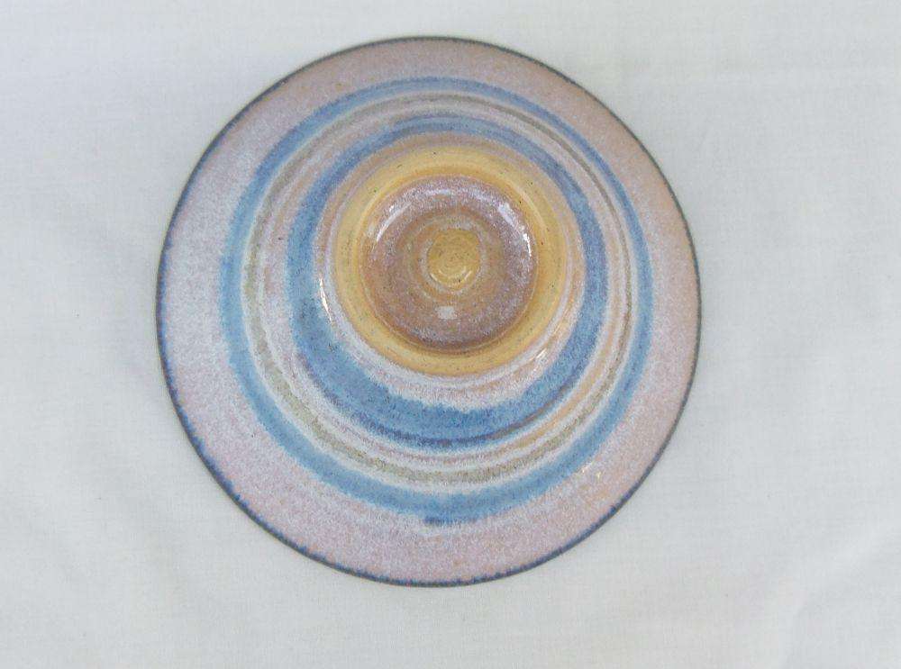 A vintage hand made pottery bowl