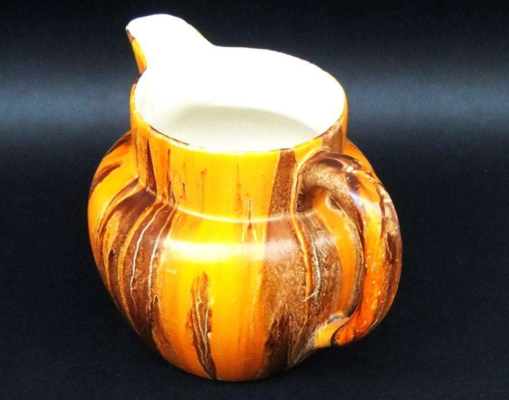 A hand painted 1930`s Art Deco period water jug by Myott, son & co England