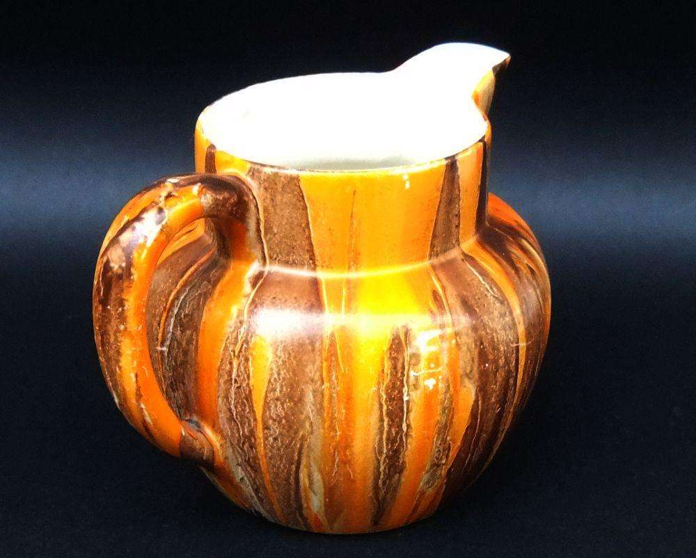 A hand painted 1930`s Art Deco period water jug by Myott, son & co England