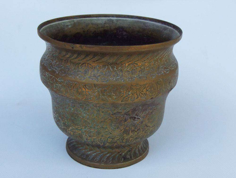 A highly detailed vintage bronze or brass planter possibly of Indian origin
