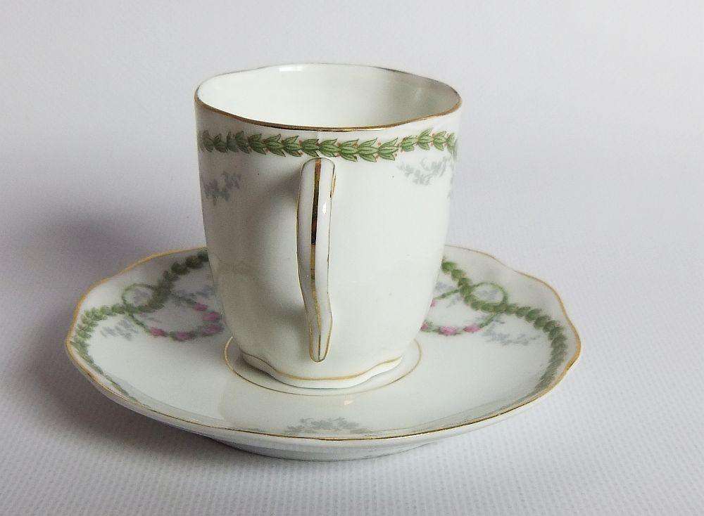 An early 20th centrury Bavarian porcelain duo in the Chrysantheme pattern , espresso sized